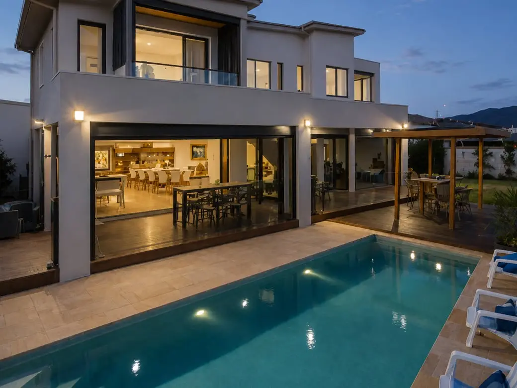 Luxury new construction home at dusk