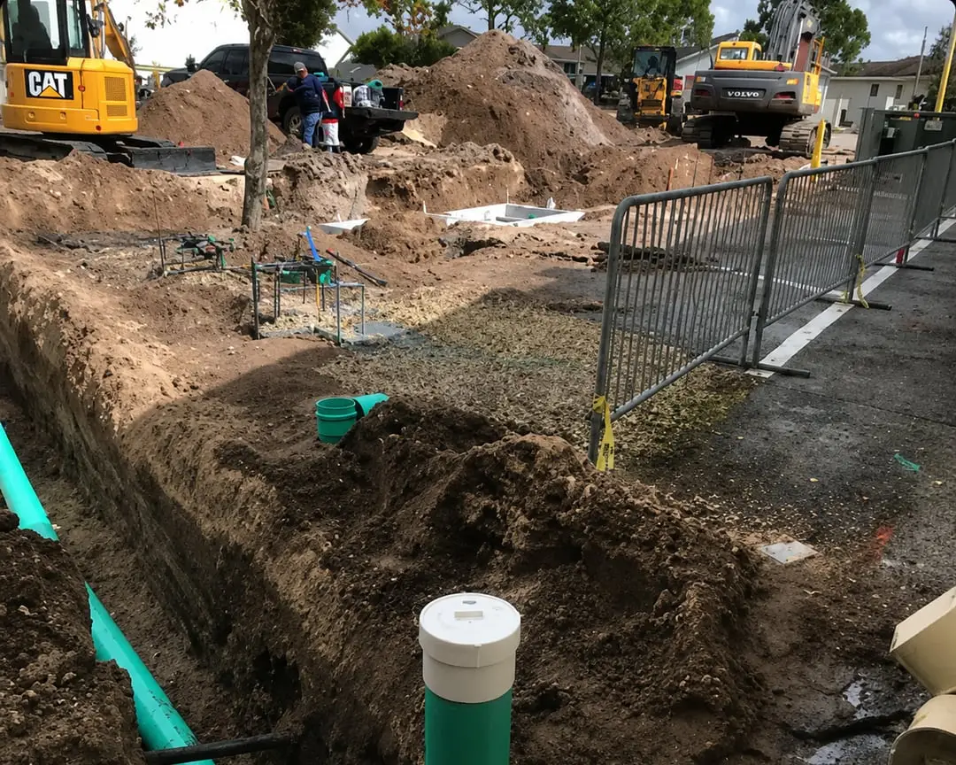 Licensed plumber installing new construction plumbing in Sarasota FL — Sunrise Contractors