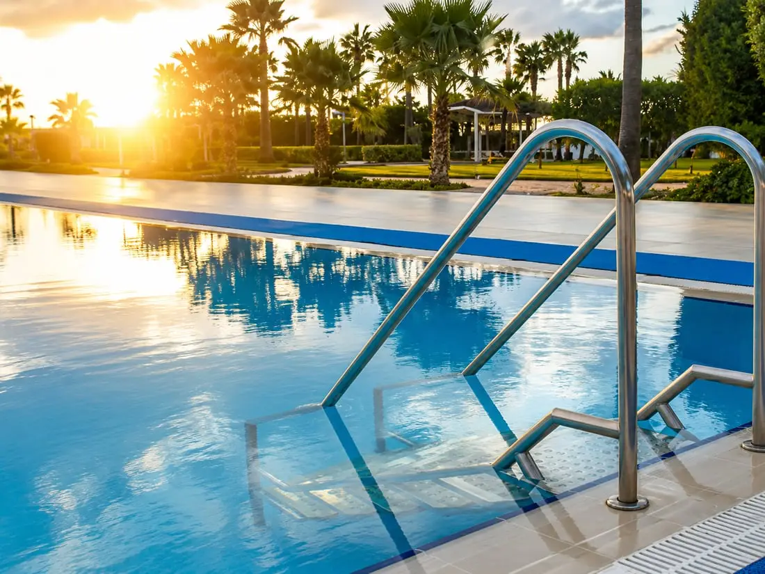 Custom pool at sunset built by Sunrise Contractors of Florida