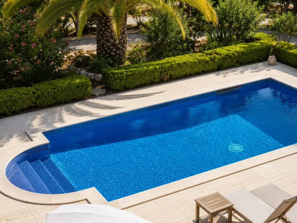 Beautiful screened pool with water features built by Sunrise Contractors