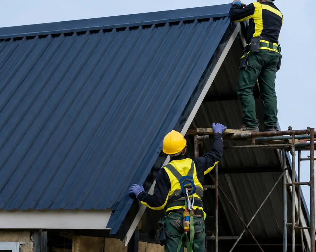 Roofing crew replacing shingles — Sunrise Contractors Sarasota FL
